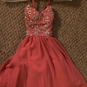 Pinkish coral went to bowl/prom dress